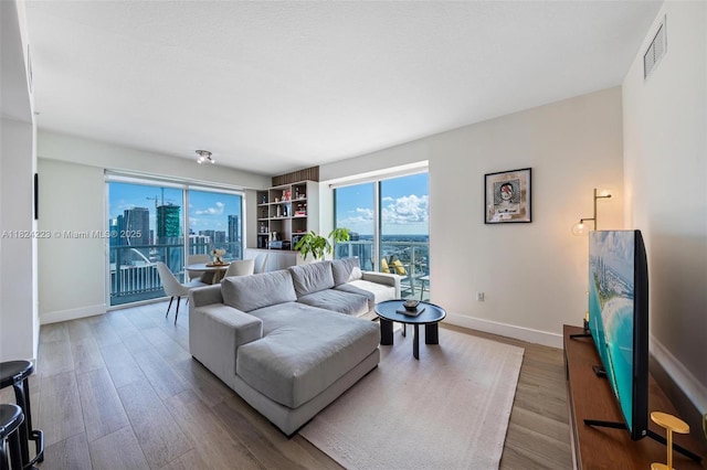 1900 N Bayshore Dr Unit 4111, Miami, FL 33132 - living room with wood finished floors and a view of city