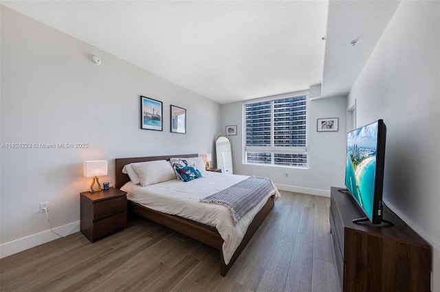 1900 N Bayshore Dr Unit 4111, Miami, FL 33132 - bedroom featuring wood finished floors and baseboards