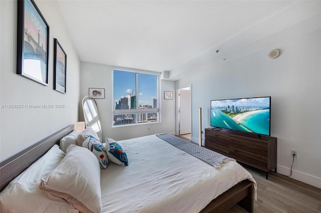 1900 N Bayshore Dr Unit 4111, Miami, FL 33132 - bedroom with wood finished floors and baseboards