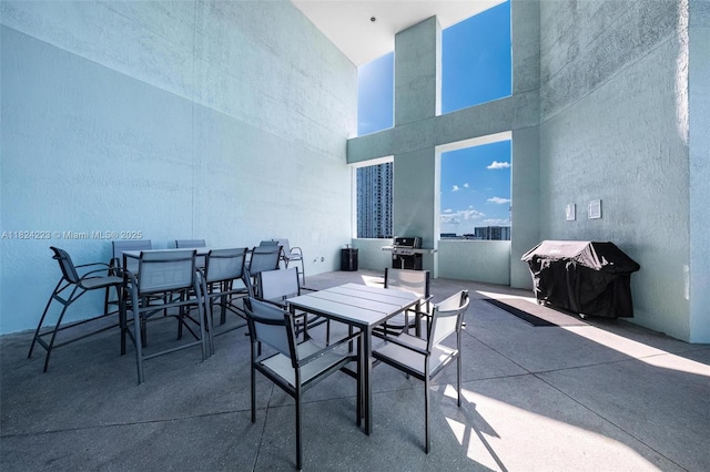 1900 N Bayshore Dr Unit 4111, Miami, FL 33132 - view of patio with outdoor dining area and area for grilling