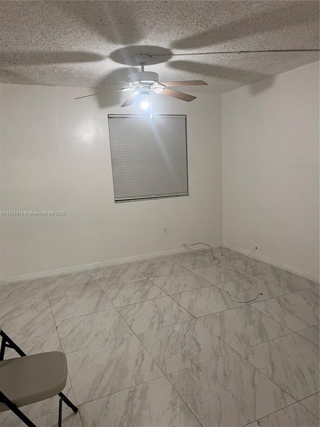 6214 SW 131st Ct Unit 103, Miami, FL 33183 - unfurnished room with ceiling fan, a textured ceiling, and marble finish flooring
