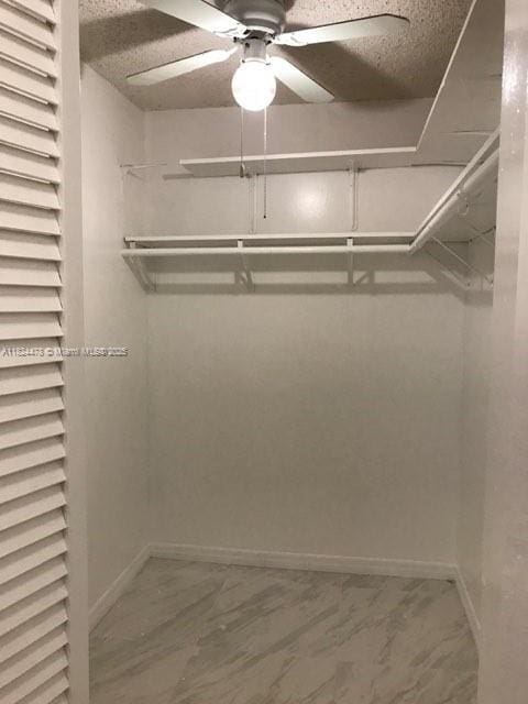 6214 SW 131st Ct Unit 103, Miami, FL 33183 - spacious closet with a ceiling fan