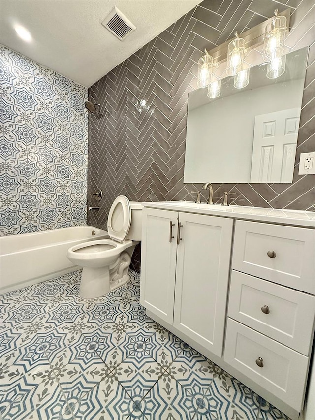 4438 E Riverside Dr, Fort Myers, FL 33905 - bathroom featuring tile walls, vanity,  shower combination, and tile patterned floors