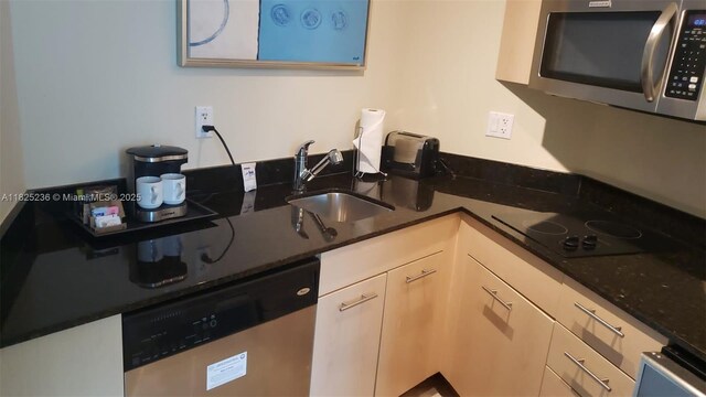2670 E Sunrise Blvd Unit 1411, Fort Lauderdale, FL 33304 - kitchen with appliances with stainless steel finishes and a sink