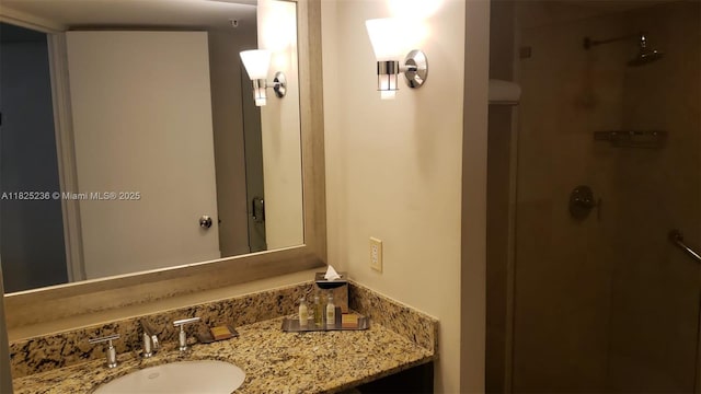 2670 E Sunrise Blvd Unit 1411, Fort Lauderdale, FL 33304 - bathroom featuring a shower stall and vanity