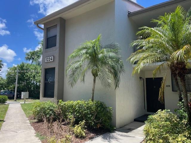 1224 S Military Trl Unit 2312, Deerfield Beach, FL 33442 - view of side of home with stucco siding