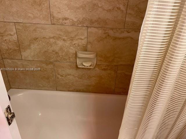 1224 S Military Trl Unit 2312, Deerfield Beach, FL 33442 - bathroom view of a bath and curtained shower