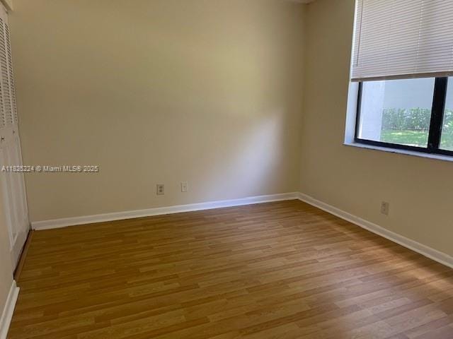 1224 S Military Trl Unit 2312, Deerfield Beach, FL 33442 - empty room with wood finished floors and baseboards