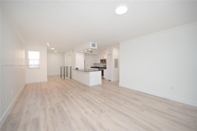 2406 Centergate Dr Unit 202, Miramar, FL 33025 - unfurnished living room with crown molding, light wood-type flooring, electric panel, and recessed lighting