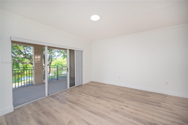 2406 Centergate Dr Unit 202, Miramar, FL 33025 - empty room with wood finished floors and ornamental molding