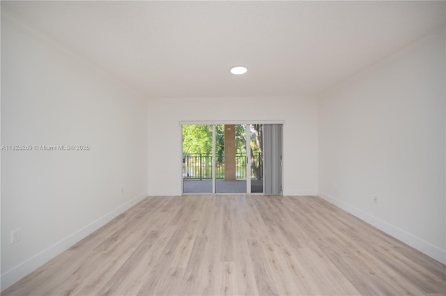 2406 Centergate Dr Unit 202, Miramar, FL 33025 - unfurnished room featuring light wood-style flooring and baseboards