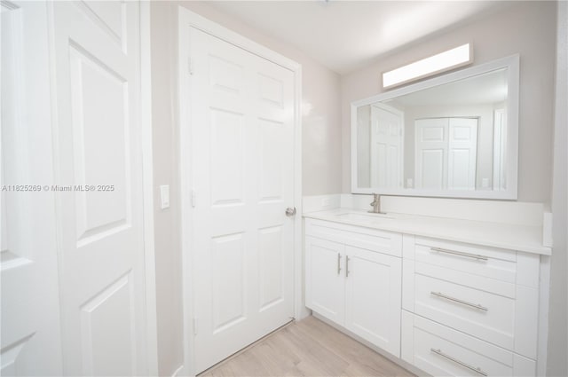 2406 Centergate Dr Unit 202, Miramar, FL 33025 - bathroom with vanity and wood finished floors
