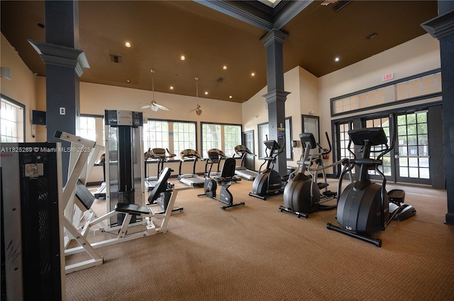2406 Centergate Dr Unit 202, Miramar, FL 33025 - gym featuring decorative columns, a towering ceiling, ceiling fan, carpet floors, and recessed lighting