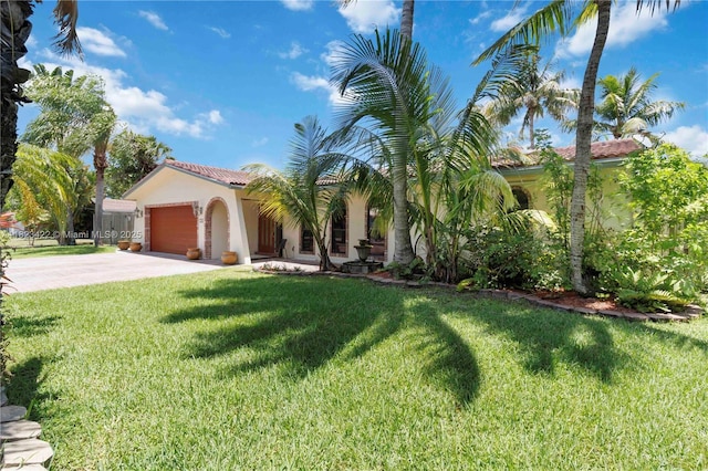 134 E Palm Dr, Margate, FL 33063 - mediterranean / spanish-style home with an attached garage, stucco siding, driveway, a front yard, and a tile roof