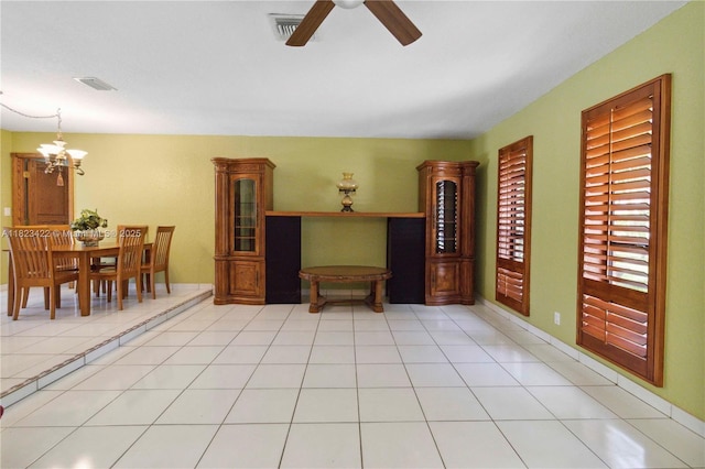 134 E Palm Dr, Margate, FL 33063 - dining room with a chandelier and a ceiling fan