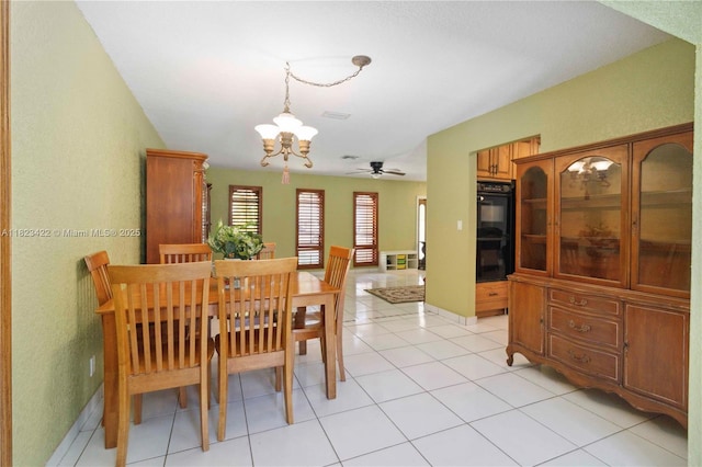 134 E Palm Dr, Margate, FL 33063 - dining room with a chandelier, ceiling fan, and a textured wall