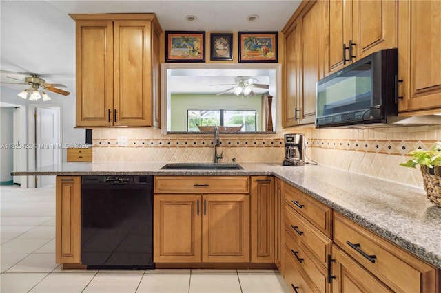 134 E Palm Dr, Margate, FL 33063 - kitchen with black appliances, a ceiling fan, brown cabinetry, and tasteful backsplash