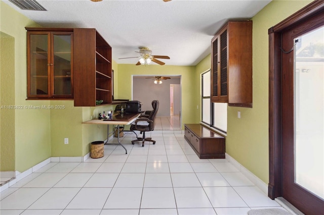 134 E Palm Dr, Margate, FL 33063 - office area with ceiling fan and light tile patterned floors