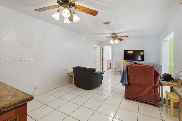 134 E Palm Dr, Margate, FL 33063 - living room with ceiling fan and light tile patterned floors