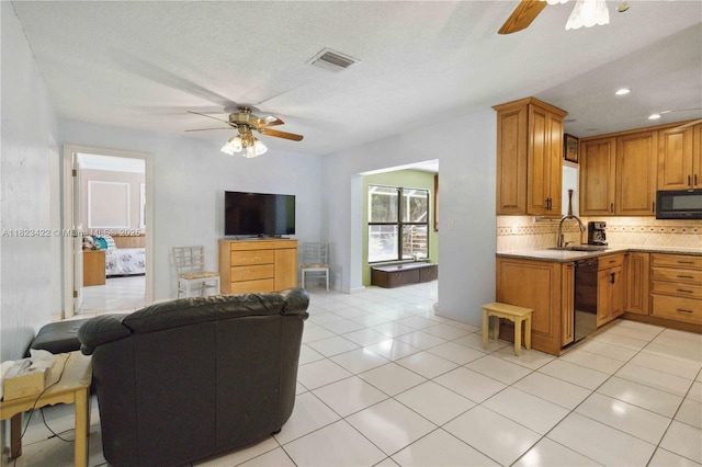 134 E Palm Dr, Margate, FL 33063 - kitchen featuring black appliances, ceiling fan, open floor plan, backsplash, and recessed lighting