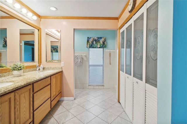 134 E Palm Dr, Margate, FL 33063 - full bath featuring double vanity, ornamental molding, and tile patterned flooring