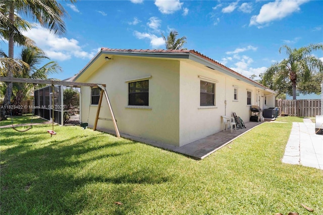 134 E Palm Dr, Margate, FL 33063 - back of property with stucco siding, a patio, a tile roof, and a pergola