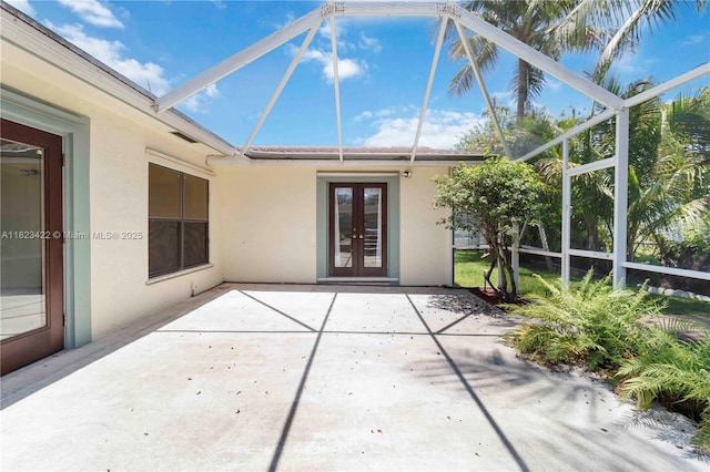 134 E Palm Dr, Margate, FL 33063 - unfurnished sunroom with french doors