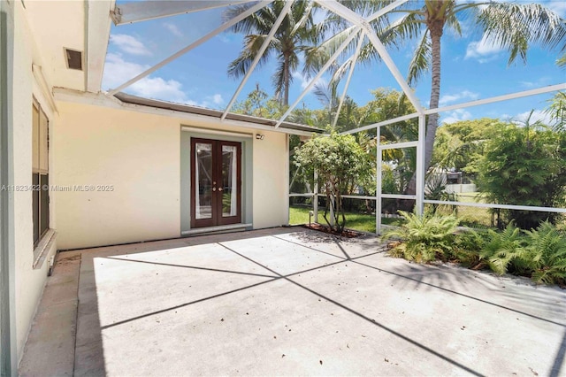 134 E Palm Dr, Margate, FL 33063 - unfurnished sunroom featuring french doors