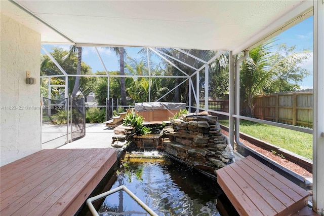 134 E Palm Dr, Margate, FL 33063 - unfurnished sunroom with a jacuzzi and a garden pond