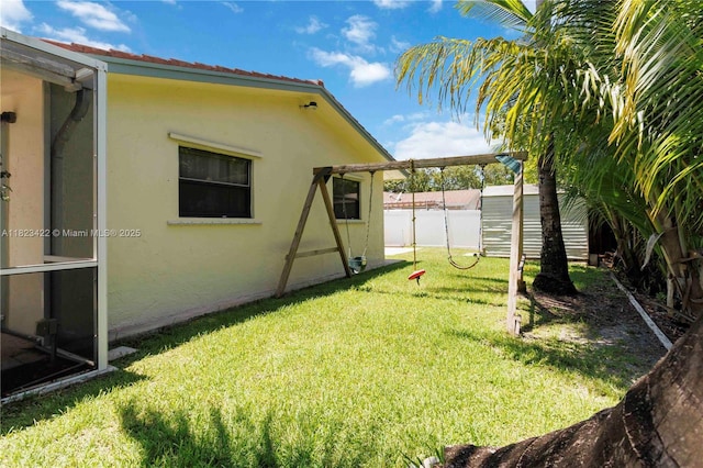 134 E Palm Dr, Margate, FL 33063 - view of yard with a storage unit