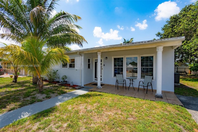 3610 NW 171st St, Miami Gardens, FL 33056 - ranch-style house featuring a porch and stucco siding