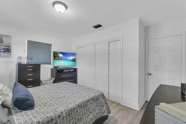 3610 NW 171st St, Miami Gardens, FL 33056 - bedroom with light wood finished floors and a closet