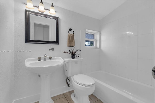3610 NW 171st St, Miami Gardens, FL 33056 - bathroom with tile patterned flooring and vaulted ceiling