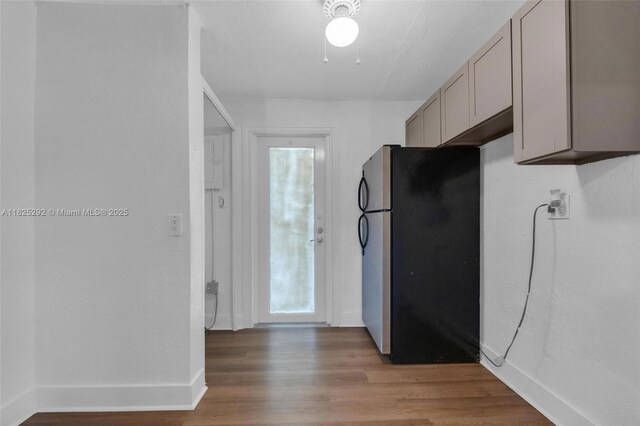 3610 NW 171st St, Miami Gardens, FL 33056 - kitchen featuring freestanding refrigerator, light wood-style flooring, healthy amount of natural light, and gray cabinets