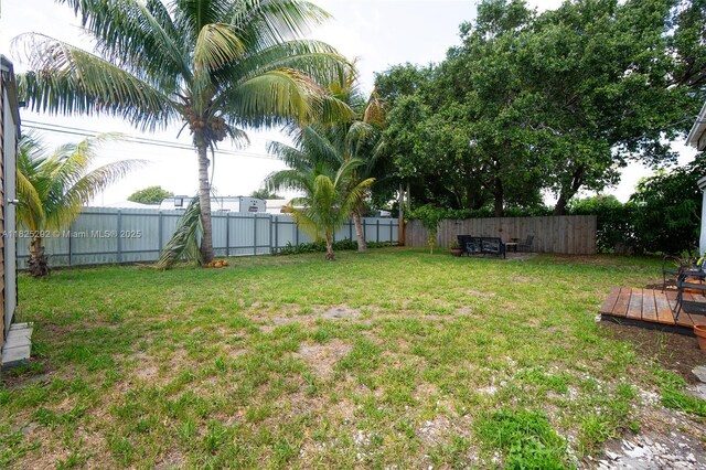 3610 NW 171st St, Miami Gardens, FL 33056 - fenced backyard featuring a wooden deck