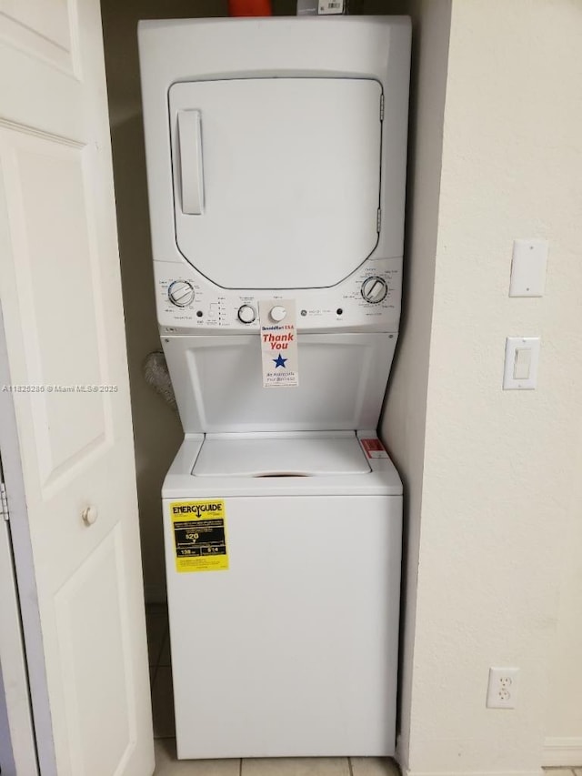 3550 Oleander Ter, Riviera Beach, FL 33404 - laundry room featuring stacked washer / drying machine