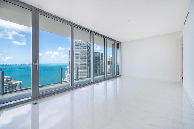 300 Biscayne Blvd Way Unit 4301, Miami, FL 33131 - empty room with expansive windows and a water view