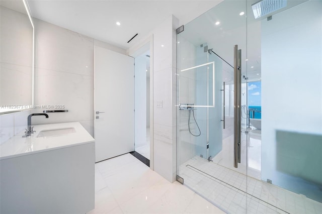 300 Biscayne Blvd Way Unit 4301, Miami, FL 33131 - bathroom featuring a marble finish shower, double vanity, and recessed lighting