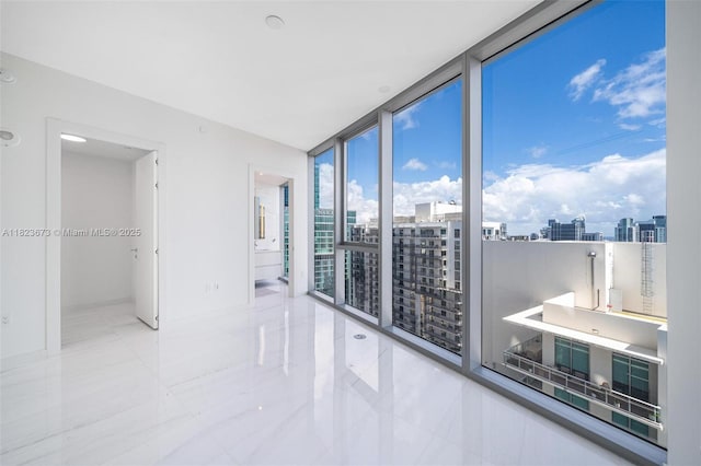 300 Biscayne Blvd Way Unit 4301, Miami, FL 33131 - unfurnished room with expansive windows, a view of city, and tile patterned flooring