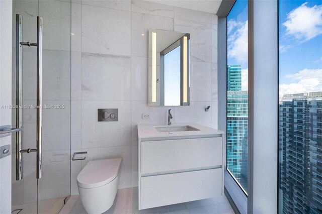 300 Biscayne Blvd Way Unit 4301, Miami, FL 33131 - full bathroom with tile walls, vanity, a stall shower, and a city view
