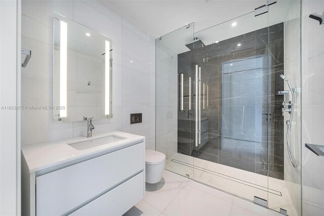 300 Biscayne Blvd Way Unit 4301, Miami, FL 33131 - full bathroom with vanity, a shower stall, and tile walls