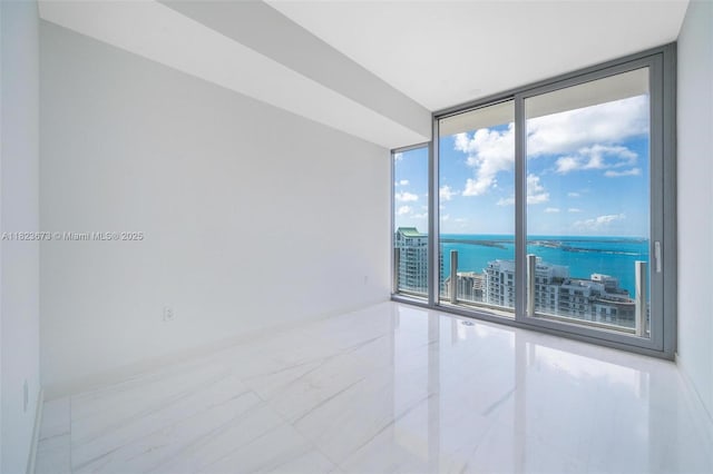 300 Biscayne Blvd Way Unit 4301, Miami, FL 33131 - spare room featuring a wall of windows and a water view