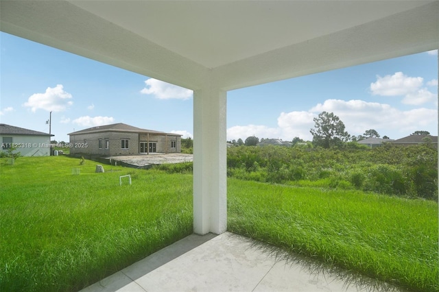 3411 62nd St W, Lehigh Acres, FL 33971 - view of green lawn with a patio area