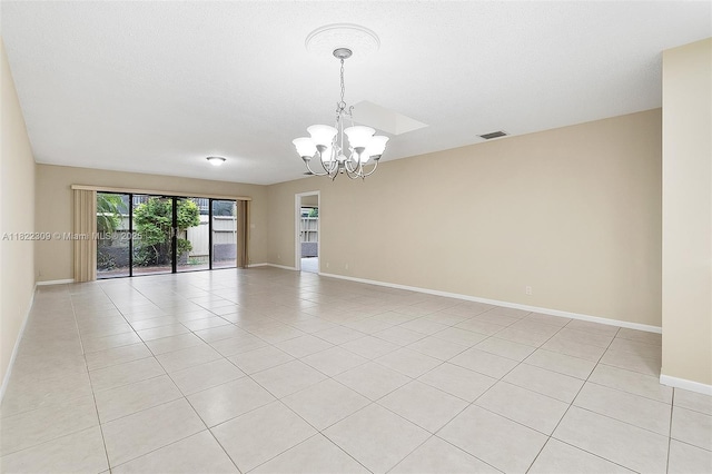 608 Saint Andrews Rd Unit 46, Hollywood, FL 33021 - spare room featuring a chandelier and light tile patterned floors