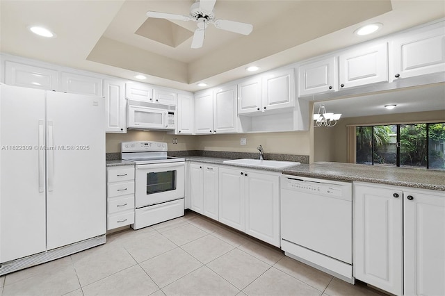608 Saint Andrews Rd Unit 46, Hollywood, FL 33021 - kitchen with white appliances, recessed lighting, light tile patterned floors, and white cabinets