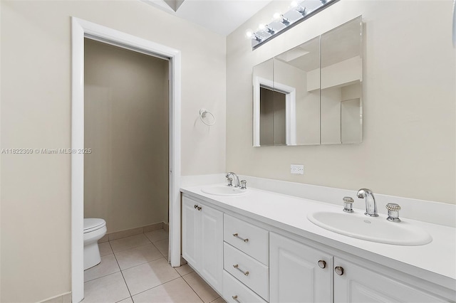 608 Saint Andrews Rd Unit 46, Hollywood, FL 33021 - bathroom with double vanity and tile patterned floors