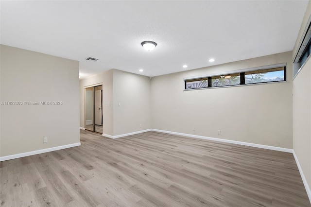 608 Saint Andrews Rd Unit 46, Hollywood, FL 33021 - empty room with light wood-style floors and recessed lighting