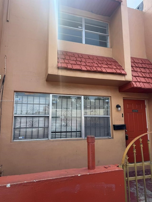 4045 NW 19th St, Lauderhill, FL 33313 - entrance to property with stucco siding