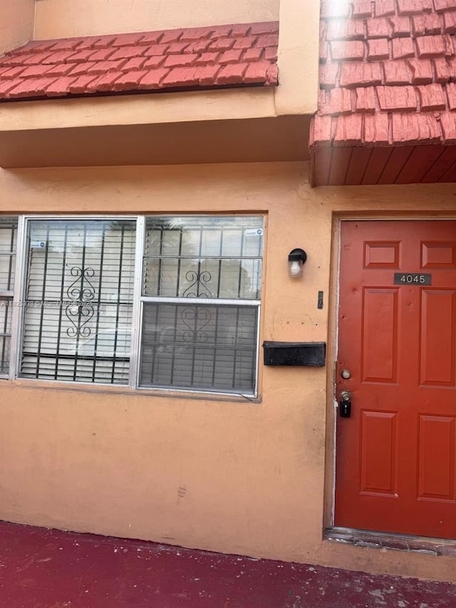 4045 NW 19th St, Lauderhill, FL 33313 - view of exterior entry with stucco siding
