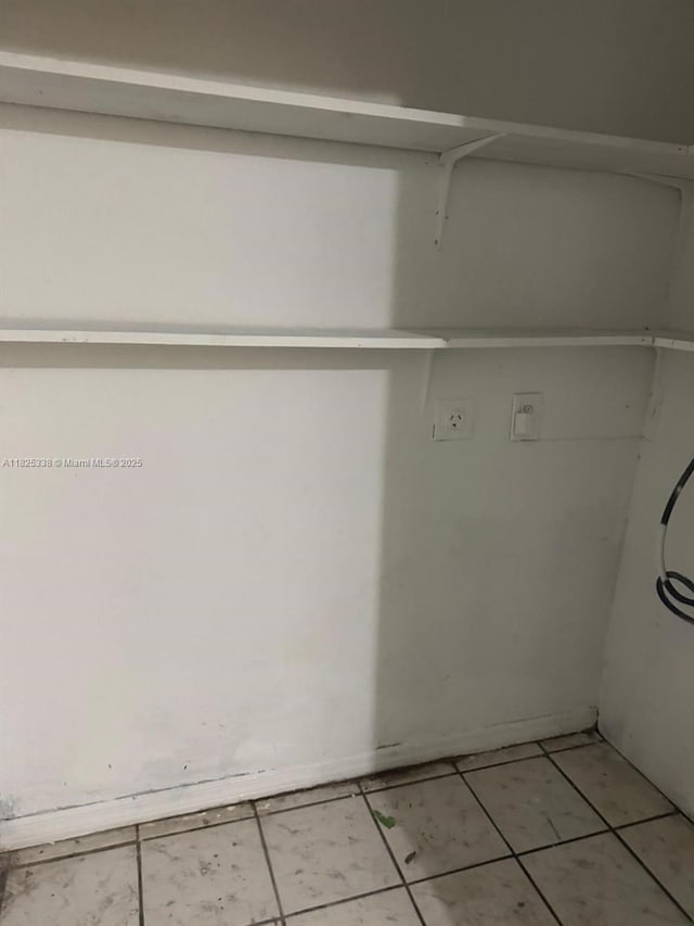 4045 NW 19th St, Lauderhill, FL 33313 - washroom featuring light tile patterned floors